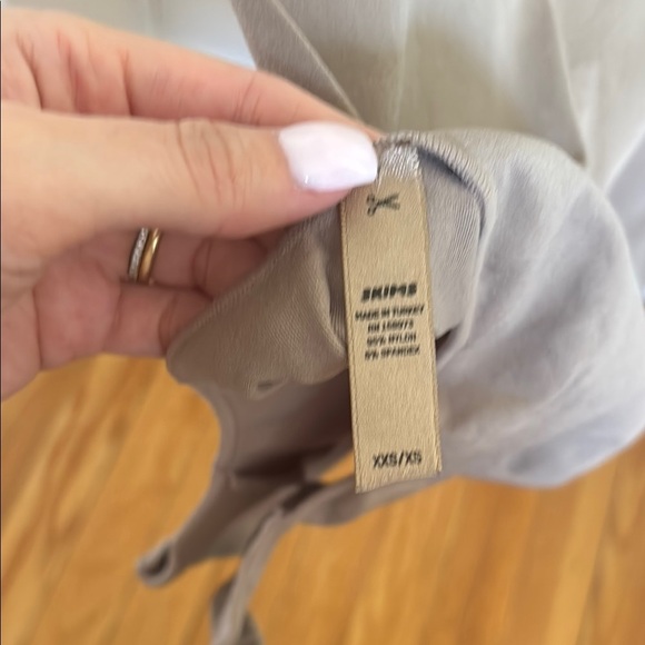 SKIMS Tan Bodysuit with Scoop Neckline and High-Cut Legs - Picture 2 of 3